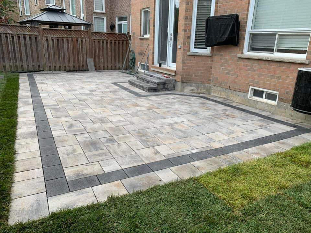 Retaining wall and armour stone landscaping project